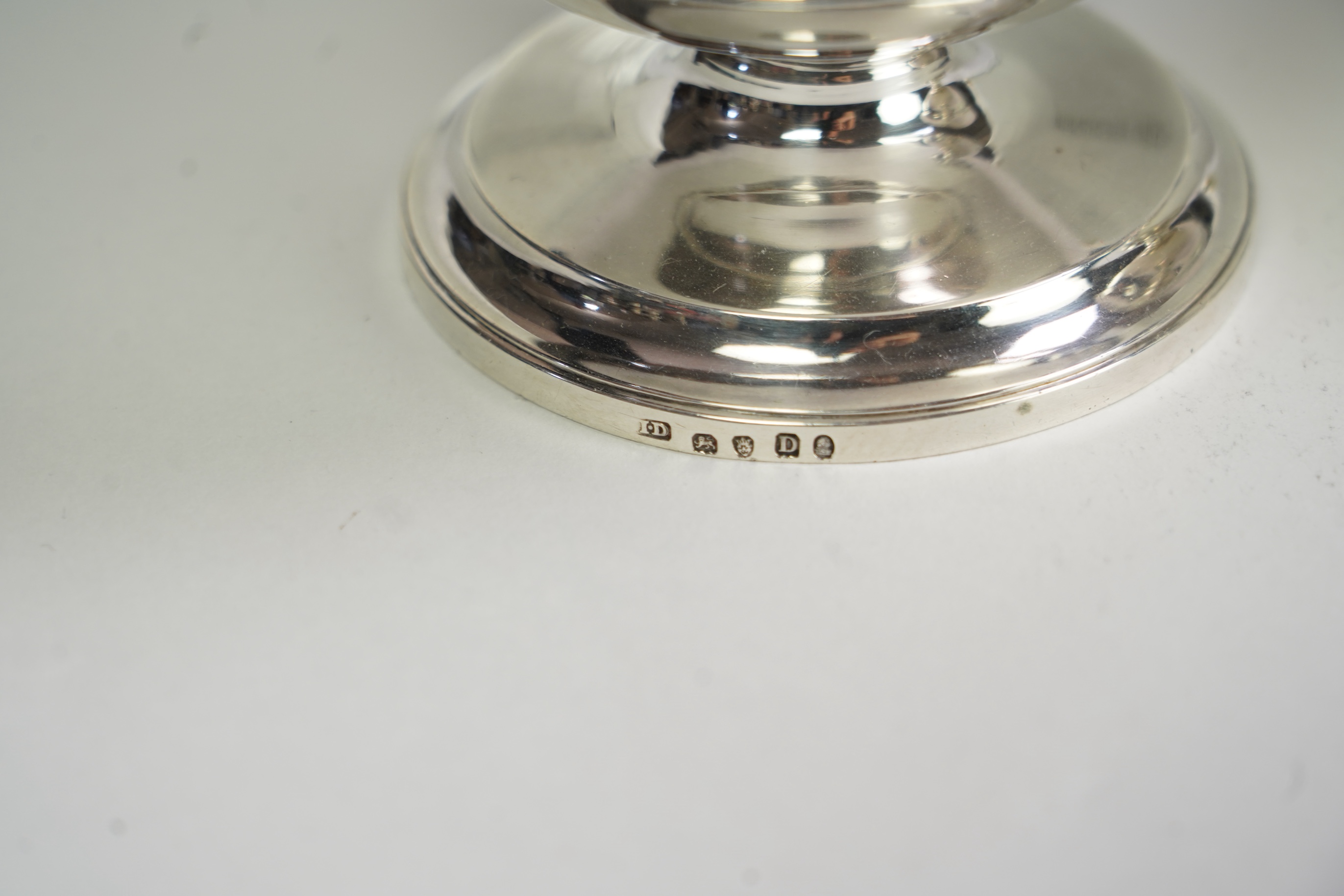 Two George III graduated silver pedestal sugar baskets, by James Darquits
